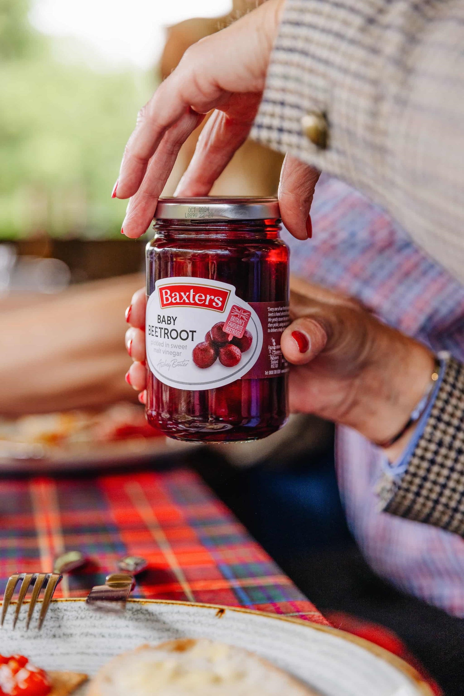 Opening a jar of Baxters Baby Beetroot