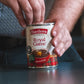 A can of Royal Game Soup being opened
