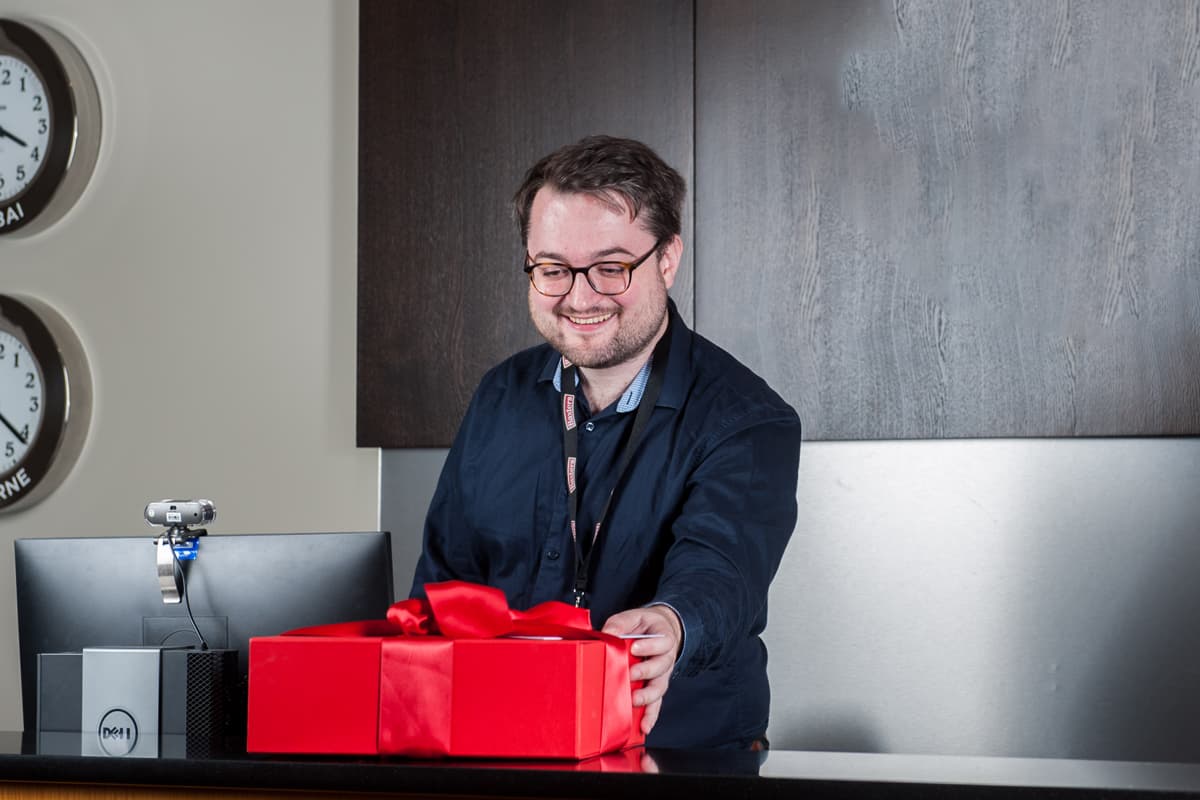 Corporate Gift Hamper Being Opened by a staff member