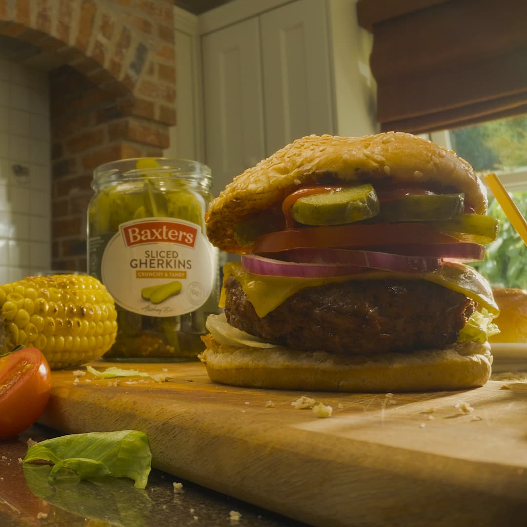 Sliced Gherkins placed on a burger